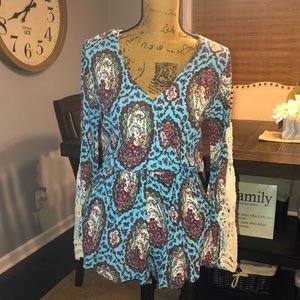 Small Romper with Paisley Print with crochet sleeves. New with tags so cute!!